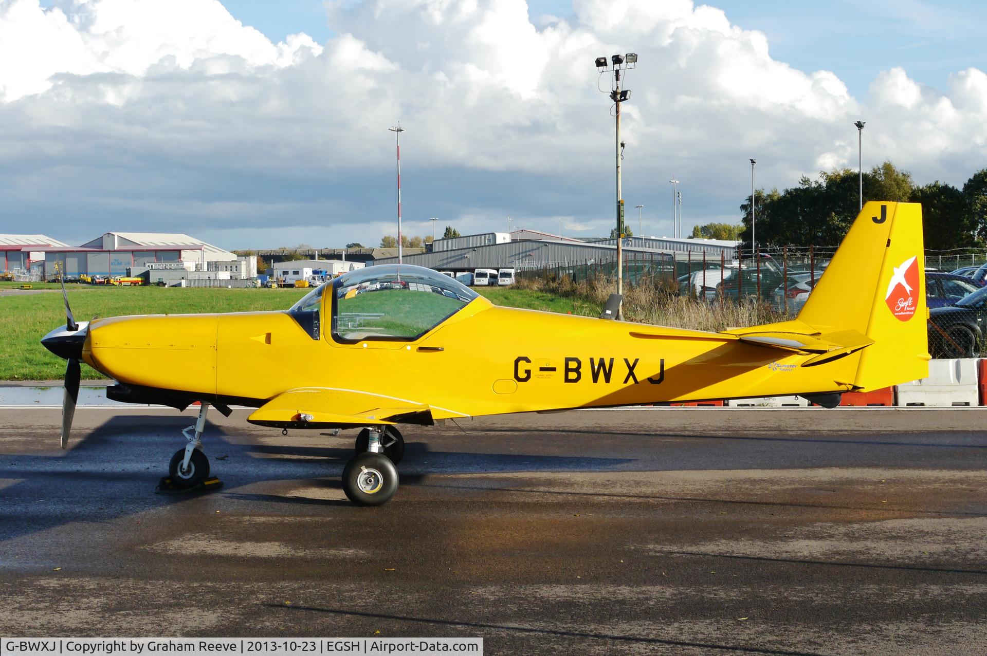 G-BWXJ, 1996 Slingsby T-67M-260 Firefly C/N 2245, Parked at Norwich.