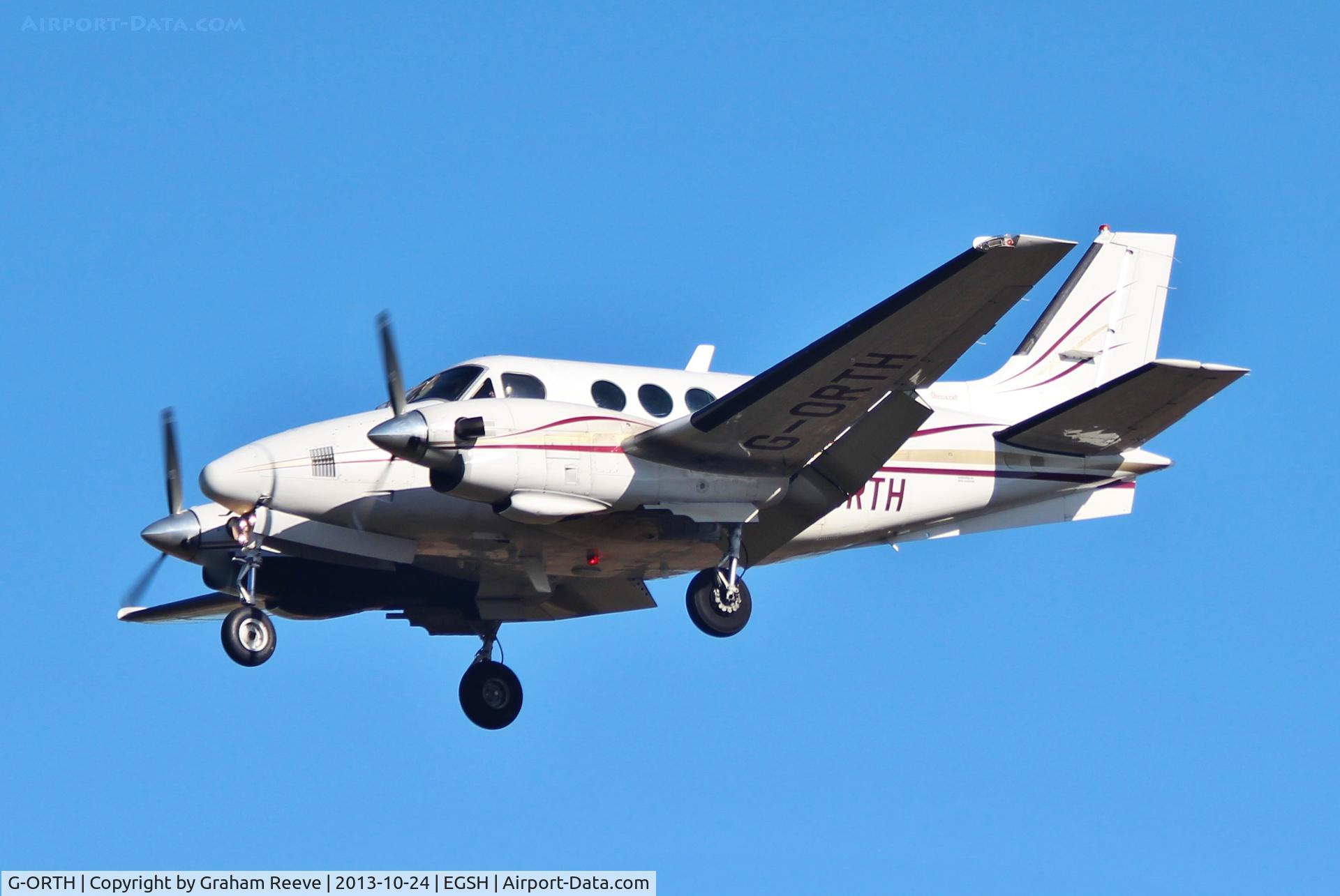 G-ORTH, 1975 Beech E90 King Air C/N LW-136, About to land at Norwich.