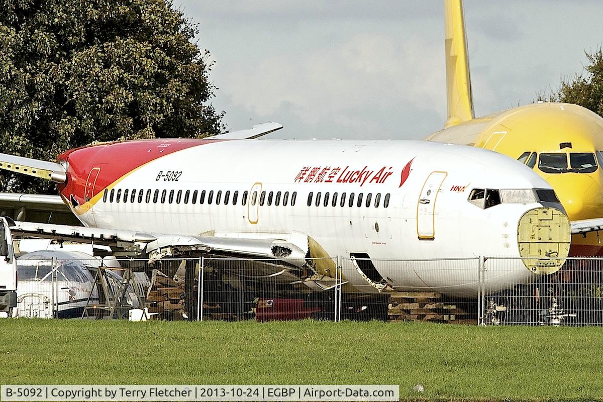 B-5092, 1999 Boeing 737-705 C/N 29092, The inappropriately named Lucky Air B737 c/n 29092 ex LN-TUG, VH-VBX  under the axe at Kemble