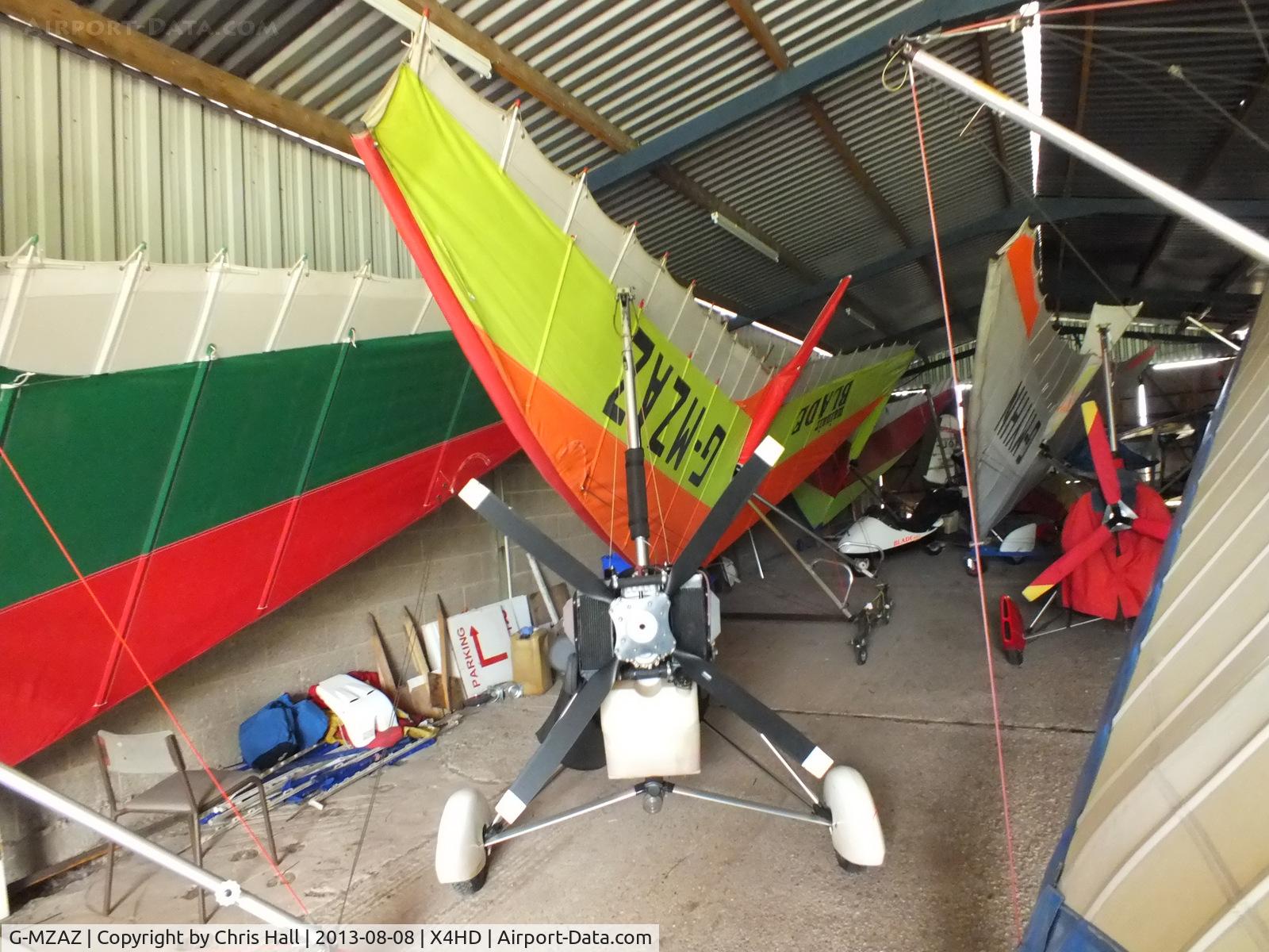 G-MZAZ, 1995 Mainair Blade C/N 1040-0595-7-W838, inside the packed hangar at Headon Airfield