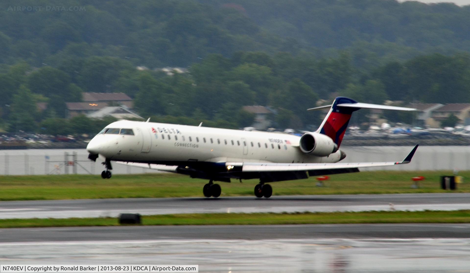 N740EV, 2004 Bombardier CRJ-701 (CL-600-2C10) Regional Jet C/N 10151, Landing National