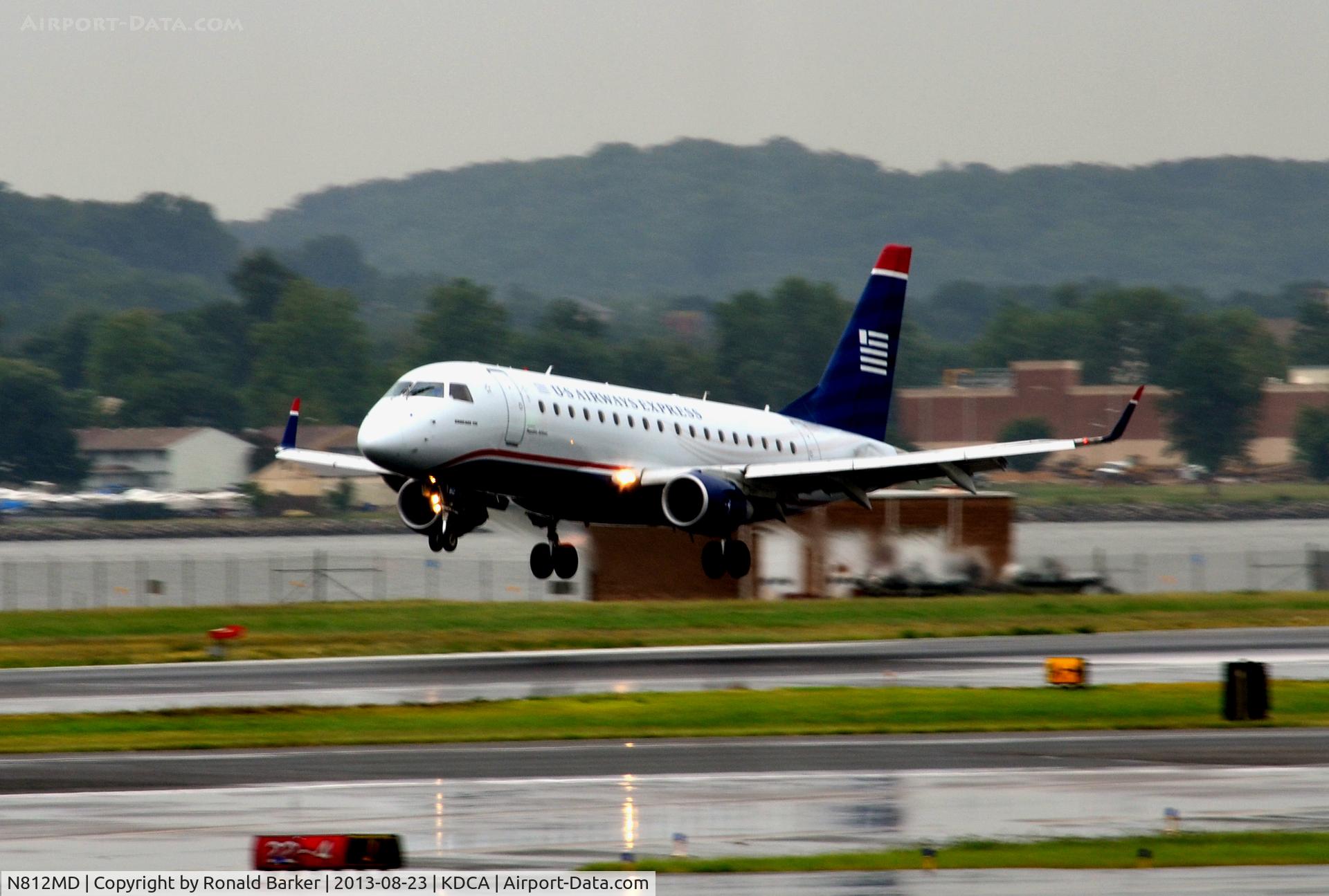 N812MD, 2004 Embraer 170SU (ERJ-170-100SU) C/N 17000030, Landing National