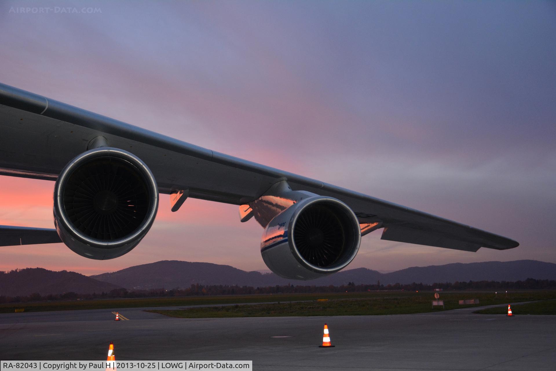 RA-82043, 1990 Antonov An-124-100 Ruslan C/N 9773054155101/0607, Left wing in the sunset