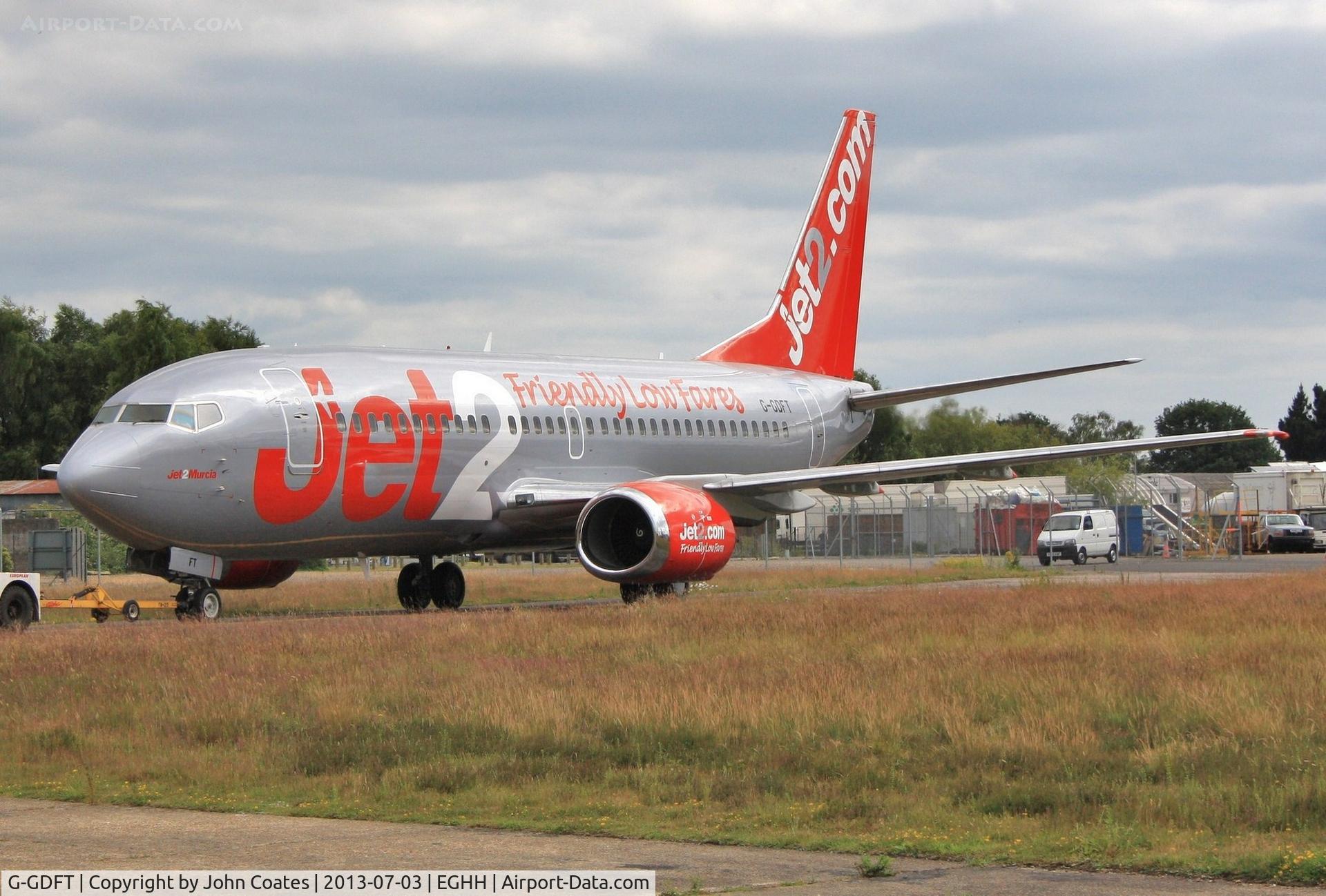 G-GDFT, 1998 Boeing 737-36Q C/N 29141, Taxiing to depart after respray