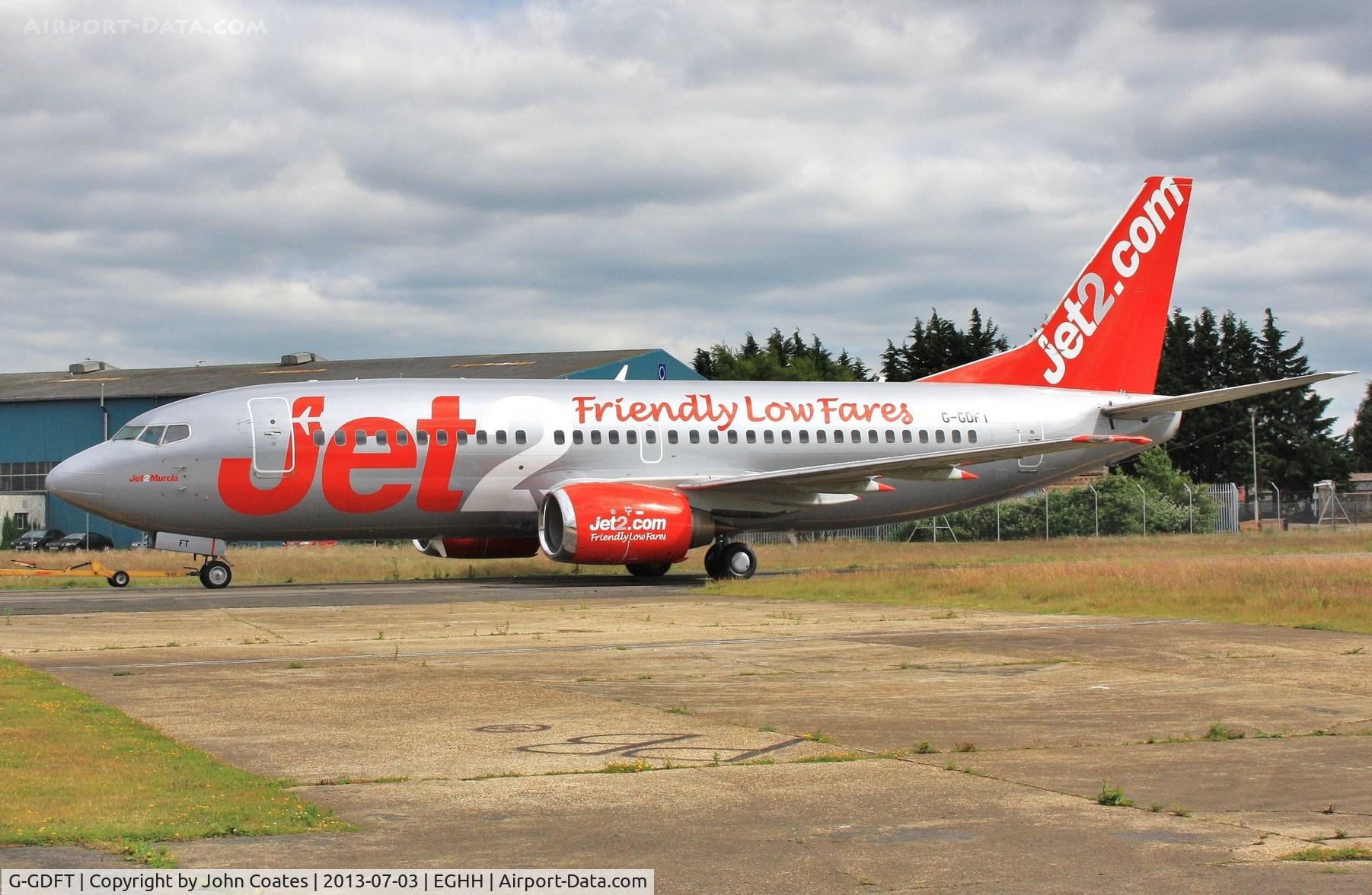 G-GDFT, 1998 Boeing 737-36Q C/N 29141, Taxiing to depart after respray