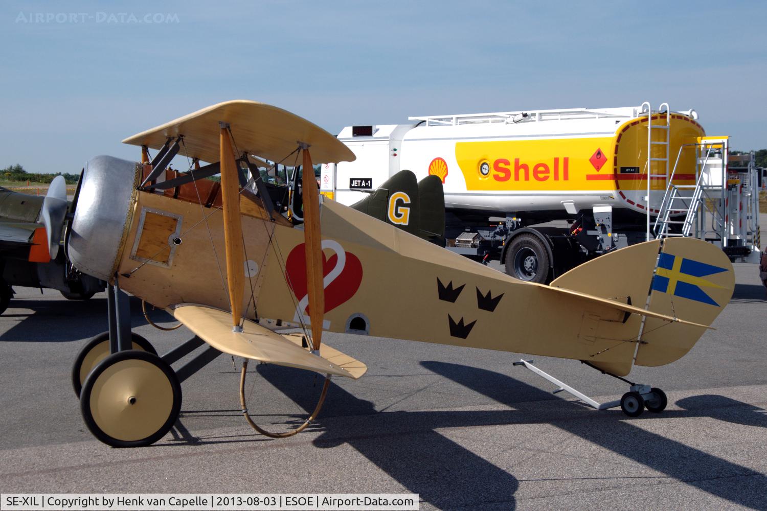SE-XIL, 1988 CVM Ö-1 Tummelisa C/N 362, Mikael Carlson's Tummelisa replica has been repainted to represent the 5th production aircraft from 1925, with the Ace of Hearts insignia on the fuselage. Here it is parked at Örebro airport, Sweden.