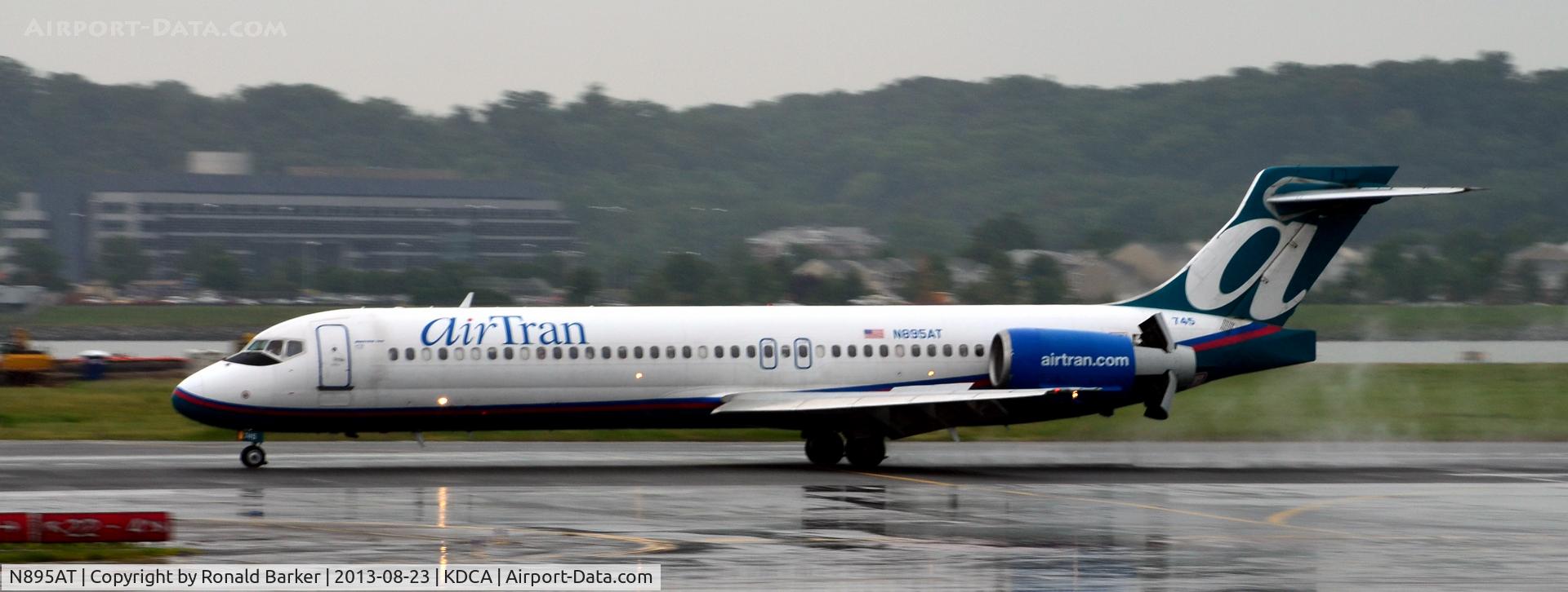 N895AT, 2004 Boeing 717-200 C/N 55047, Landing using thrust reversers  National