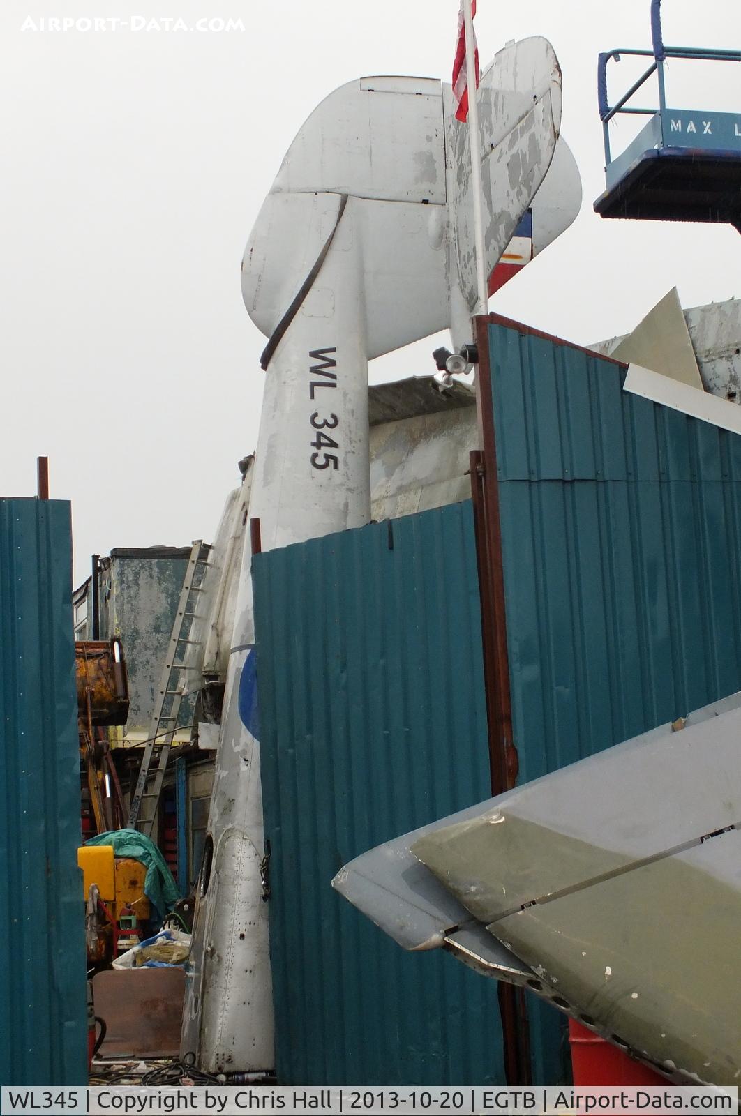 WL345, Gloster Meteor T.7 C/N Not found WL345, just the tailboom visible inside the Parkhouse Aviation yard at Booker