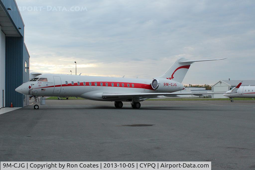9M-CJG, 1998 Bombardier BD-700-1A10 Global Express C/N 9003, This 1998 Bombardier BD-700 Global Express sits outside the Flying Colors hanger at the Peterborough, Ontario Airport