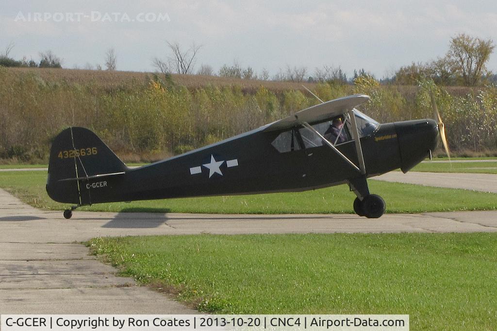 C-GCER, 1942 Taylorcraft DCO65 C/N 5948, This 1942 Taylorcraft is taxiing to its hanger after fueling on  this windy day at the Guelph, Ontario Aerodrome