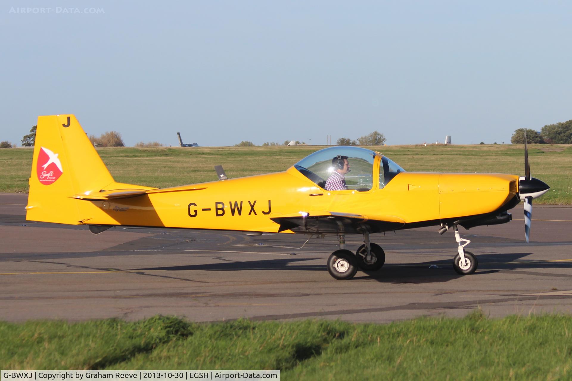 G-BWXJ, 1996 Slingsby T-67M-260 Firefly C/N 2245, Departing from Norwich.