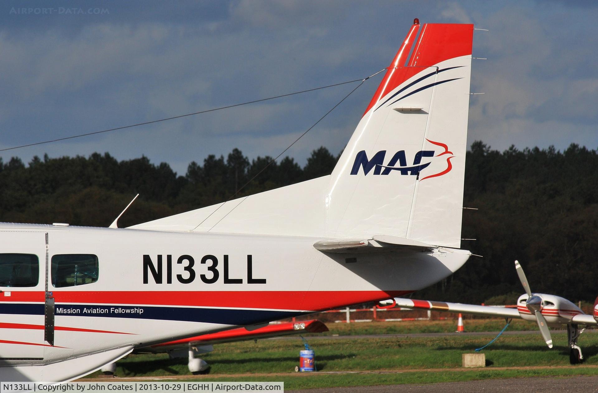 N133LL, Cessna 208B  Grand Caravan C/N 208B2134, Tail details with small titles 