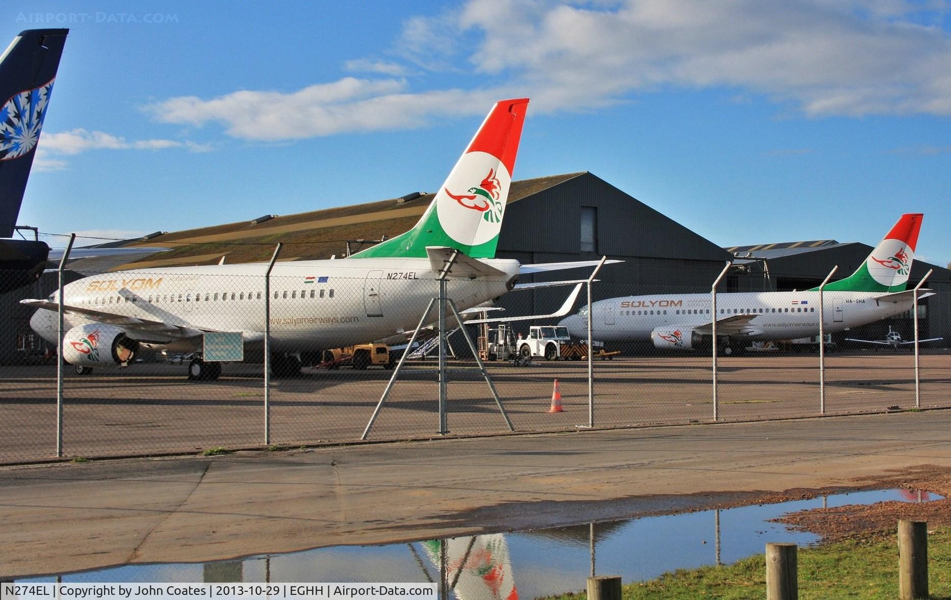 N274EL, 1991 Boeing 737-505 C/N 24274, Parked with HA-SHA awaiting their fate.