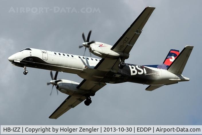 HB-IZZ, 1997 Saab 2000 C/N 2000-048, Arrival from AMS is crossing fence at rwy 26L....