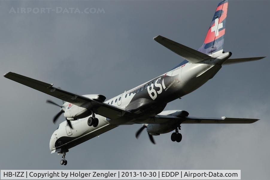 HB-IZZ, 1997 Saab 2000 C/N 2000-048, Has passed Airport fence at rwy 26L.....
