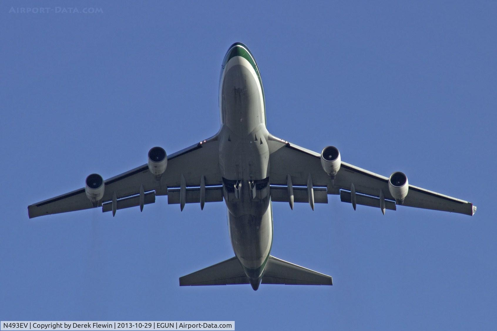 N493EV, 1993 Boeing 747-4H6 C/N 25702, Evergreen 747-4H6 overhead our campsite at the end of runway 11 at EGUN.