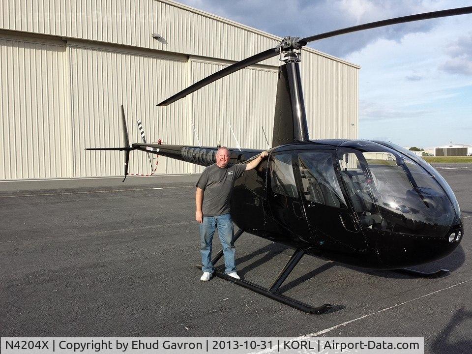 N4204X, Robinson R44 II C/N 12625, N4204X after a short flight to see the sights and sites of Orlando Downtown.
