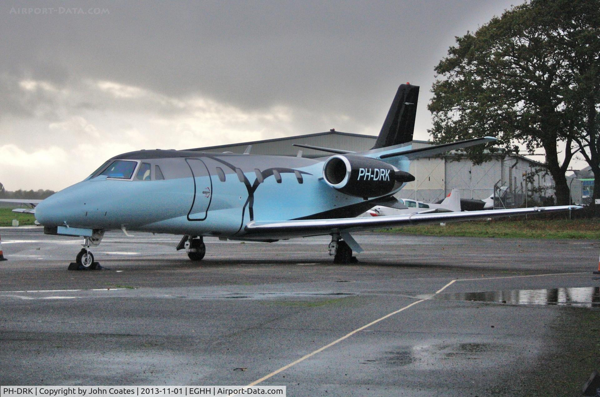 PH-DRK, 2002 Cessna 560XL Citation C/N 560-5258, At Signatures on a dark wet day