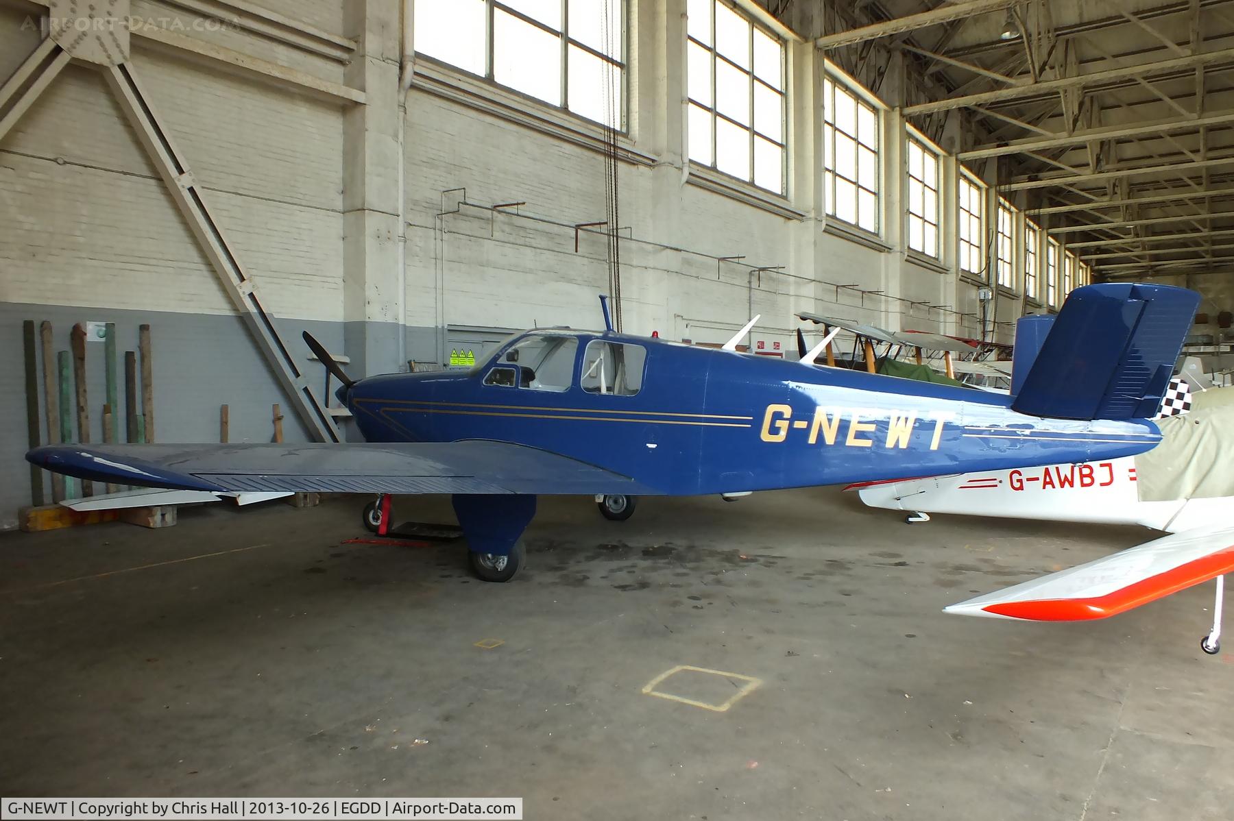 G-NEWT, 1947 Beech 35 Bonanza Bonanza C/N D-1168, hangared at Bicester