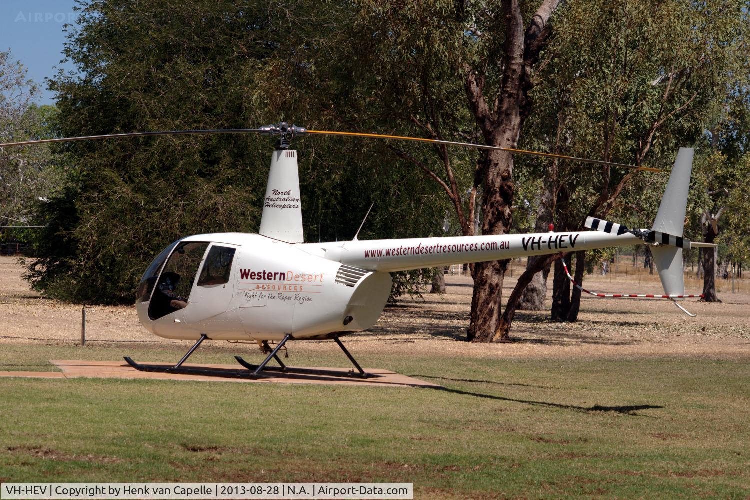 VH-HEV, 2005 Robinson R44 II C/N 10794, Robinson R44 II helicopter on its landing spot at Victoria River Roadhouse, N.T. It was used for sight-seeing flights.
