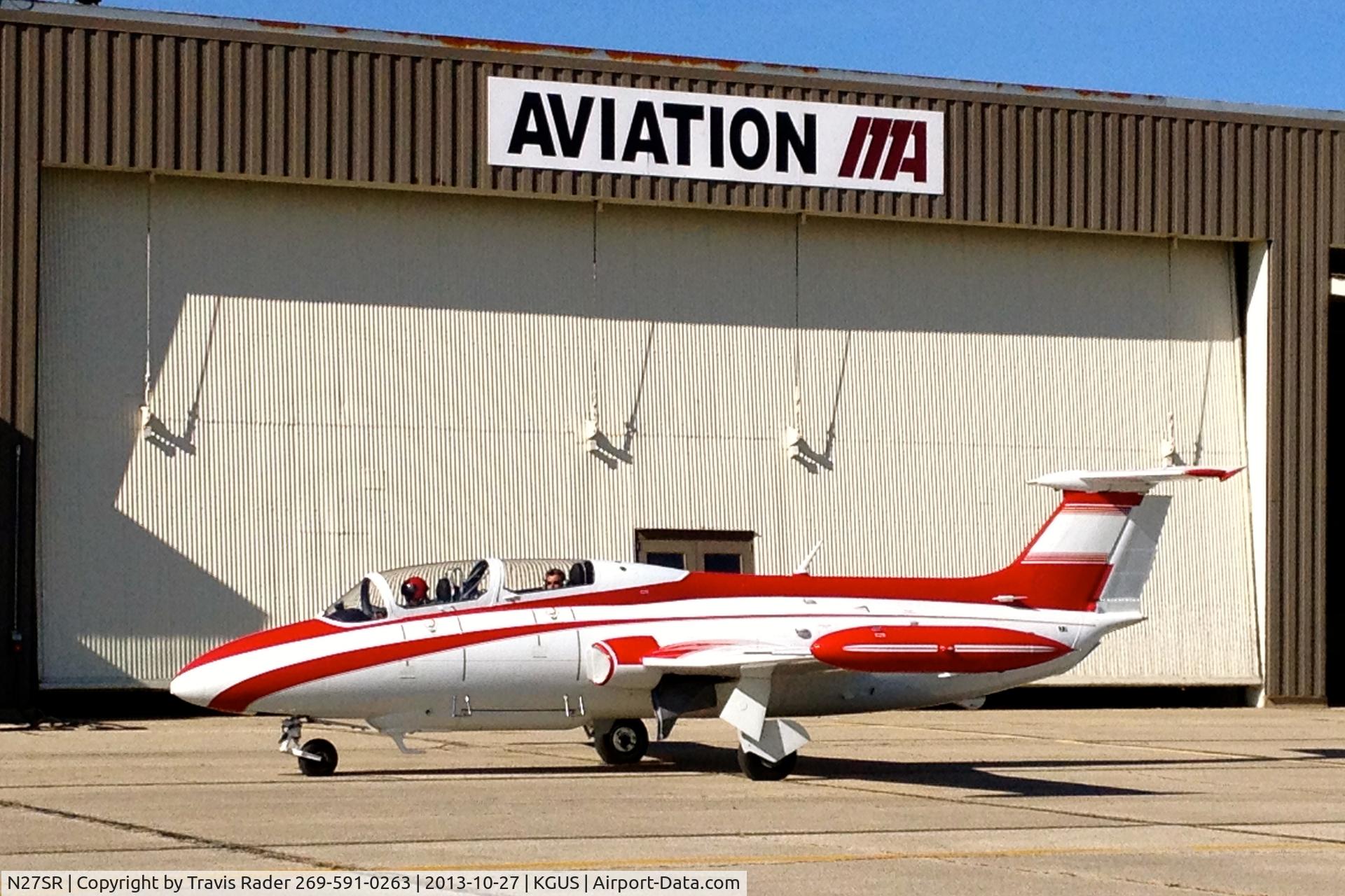 N27SR, 1969 Aero L-29R Delfin C/N 892829, N27SR at KGUS on 10/27/2013 giving rides.  Irony: A former Soviet Block reconnaissance aircraft buzzing about a former Cold War Era US Air force Base.