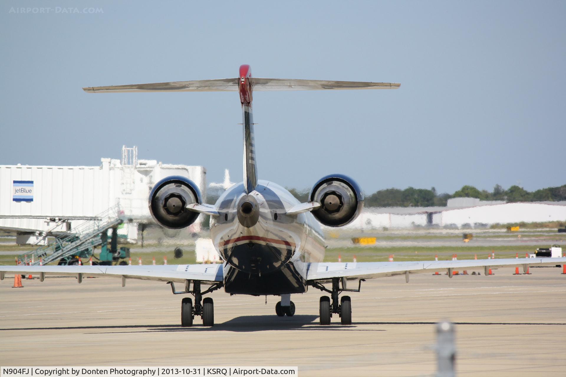 N904FJ, 2003 Bombardier CRJ-900ER (CL-600-2D24) C/N 15004, US Air 2884 operated by Mesa (N904FJ) prepares for flight at Sarasota-Bradenton International Airport