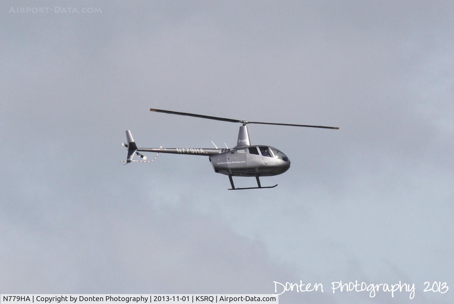 N779HA, 2011 Robinson R66 Turbine C/N 0016, Robinson R-66 (N779HA) departs Sarasota-Bradenton International Airport