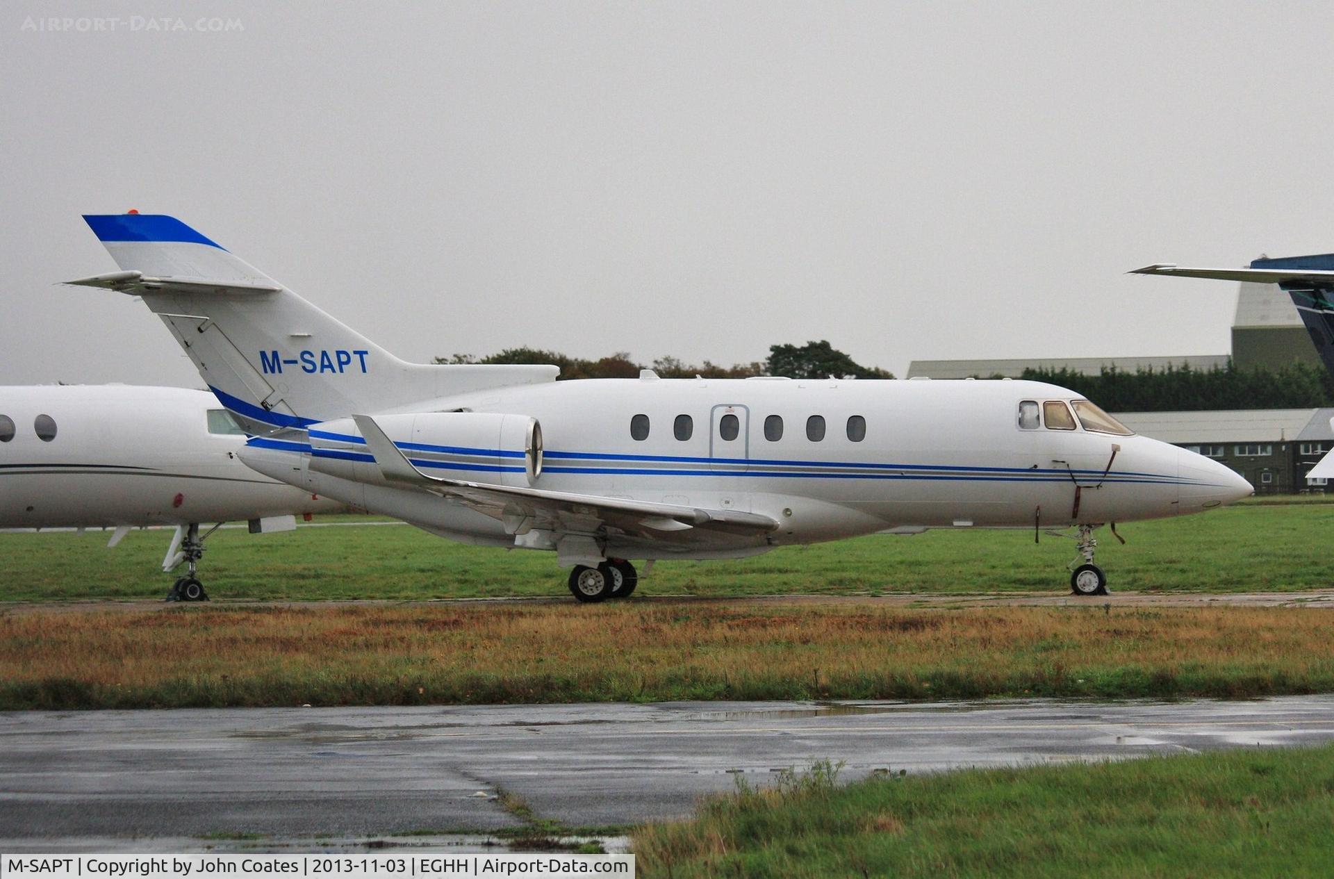 M-SAPT, 2007 Hawker Beechcraft 900XP C/N HA-0026, Parked in the drizzle at Jetworks