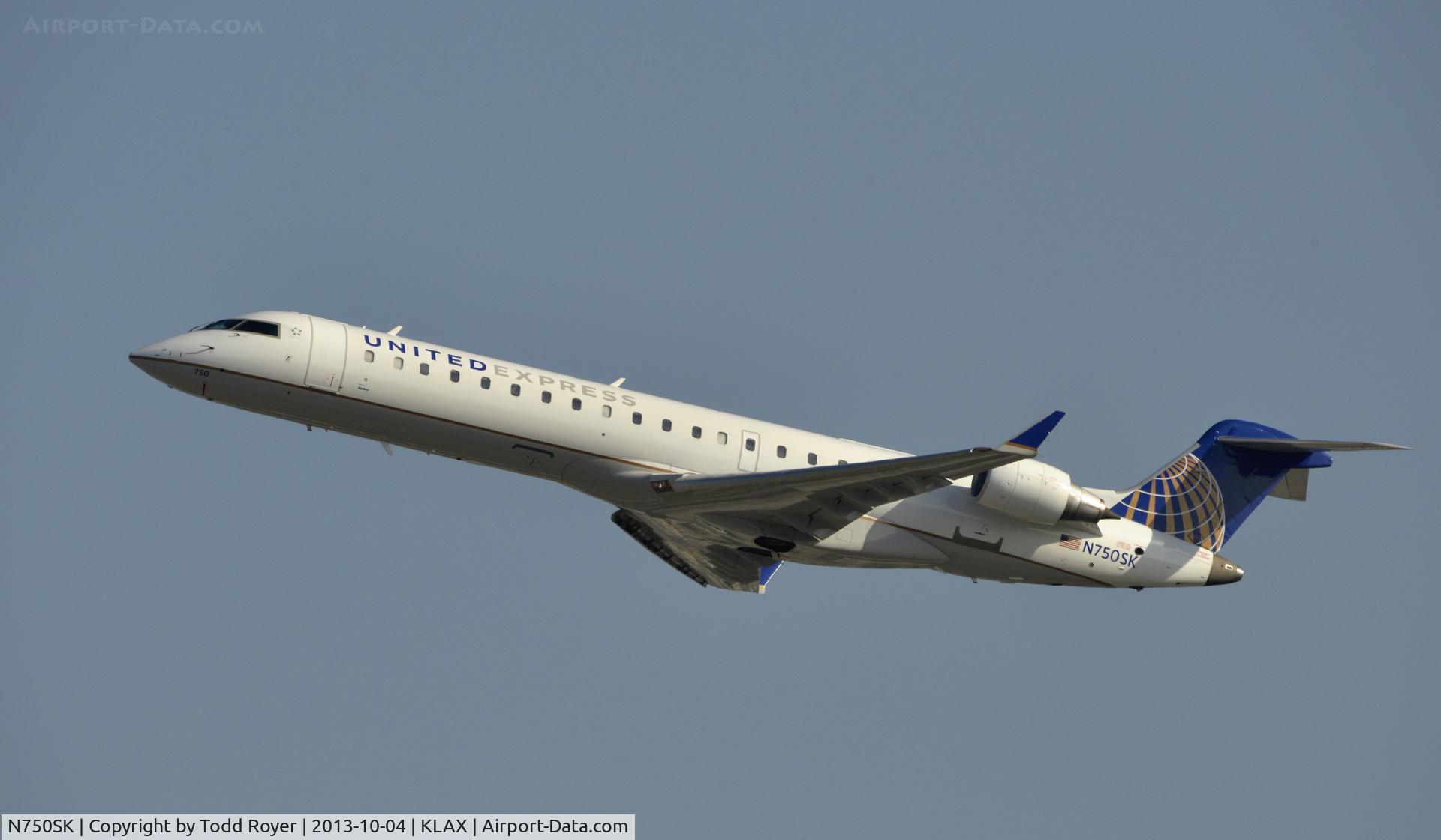 N750SK, 2005 Bombardier CRJ-701ER (CL-600-2C10) Regional Jet C/N 10207, Departing LAX