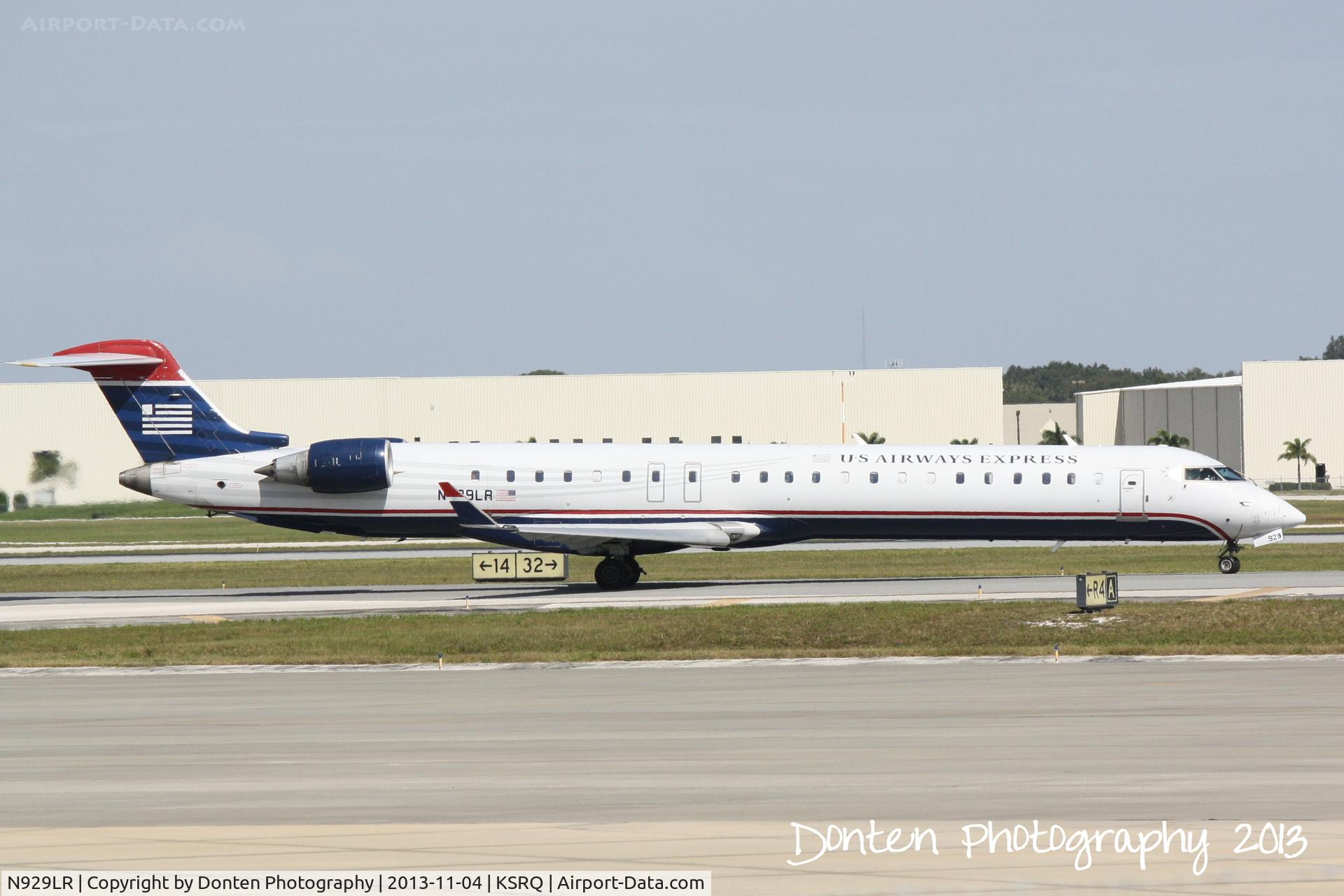 N929LR, 2005 Bombardier CRJ-900ER (CL-600-2D24) C/N 15029, US Air Flight 2884 operated by Mesa (N929LR) departs Sarasota-Bradenton International Airport enroute to Charlotte-Douglas International Airport