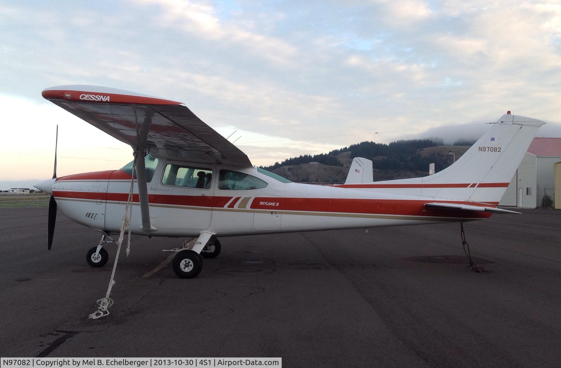 N97082, 1979 Cessna 182Q Skylane C/N 18266971, Setting along side another aircraft from ID. on a nice day n Oct.2013