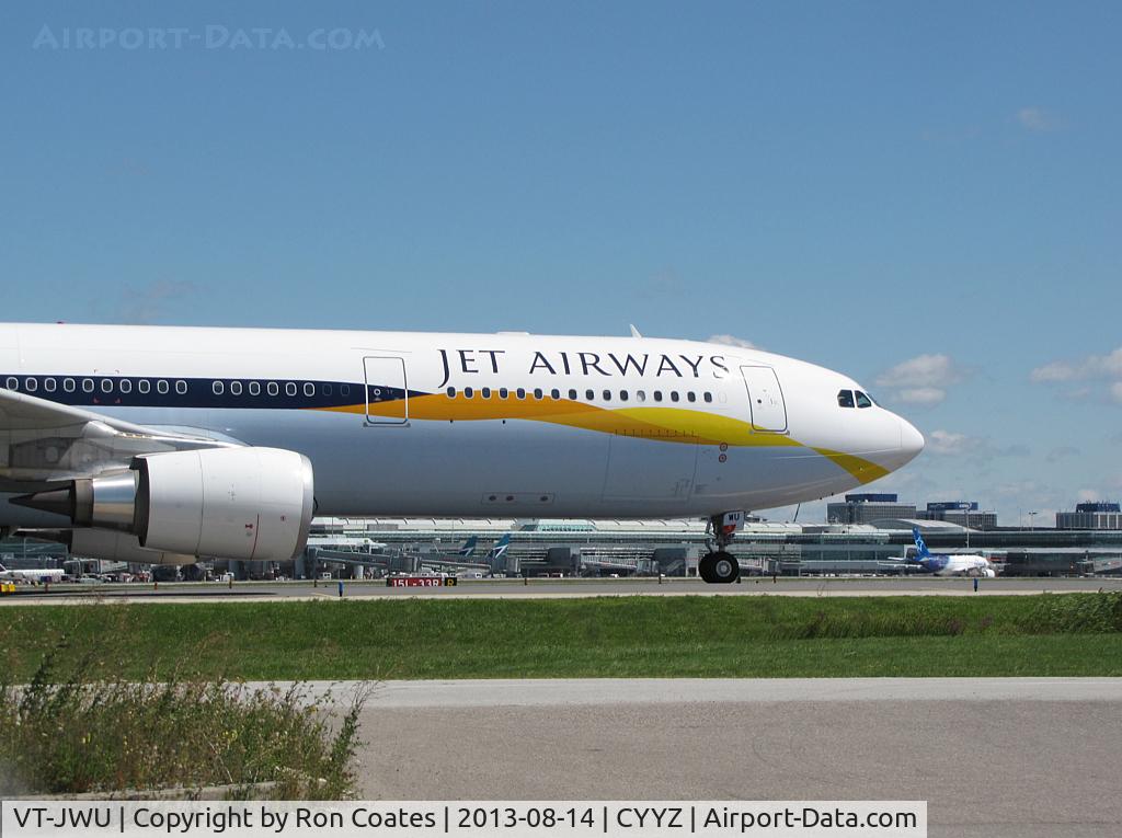 VT-JWU, 2012 Airbus A330-302 C/N 1391, 2013 Jet Airways Airbus 330-302 on the taxiway heading for his gate after landing on rwy 05 at Toronto Int'l Airport