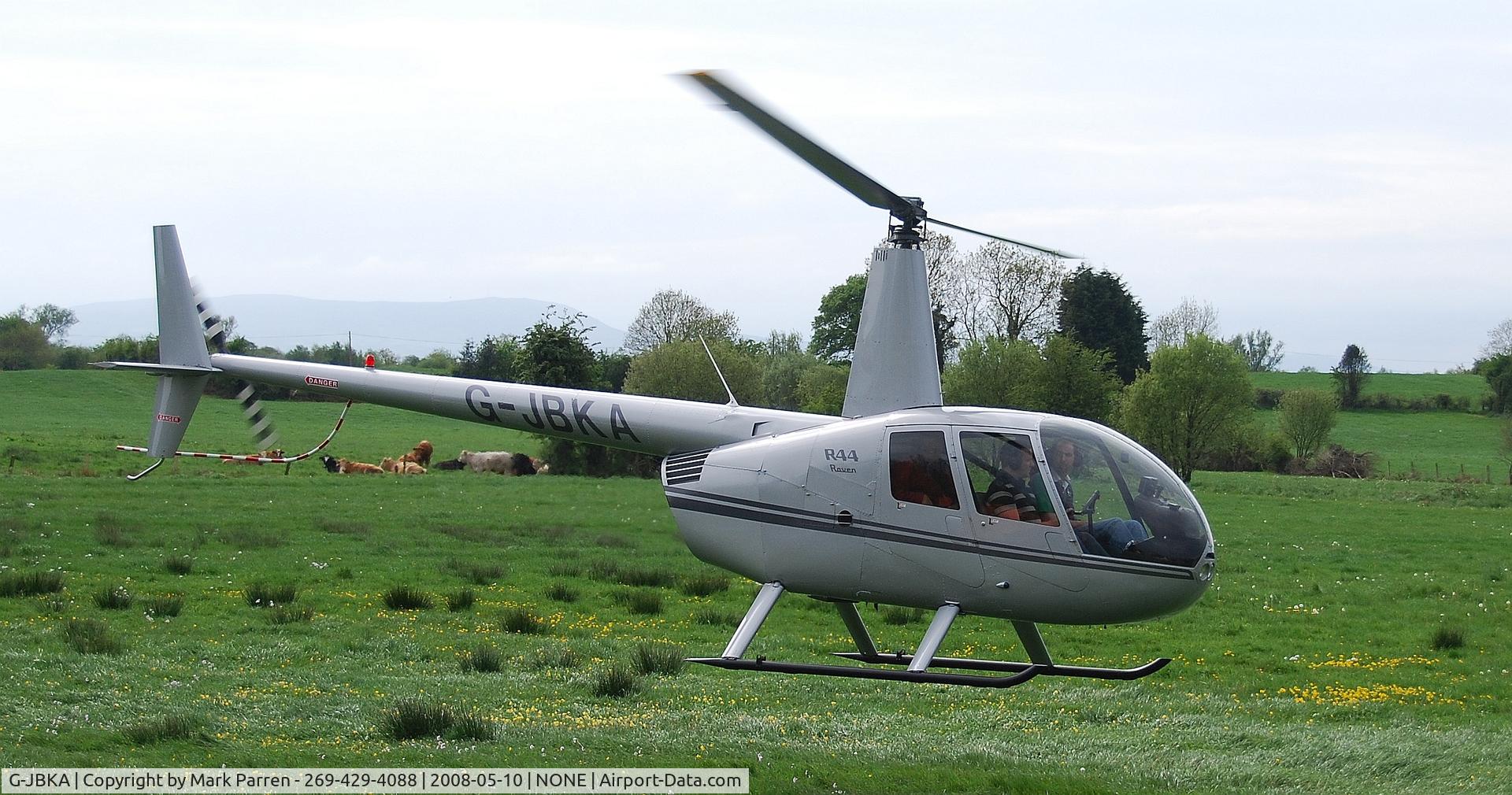 G-JBKA, 2002 Robinson R44 Raven C/N 1175, Leaving from farm.