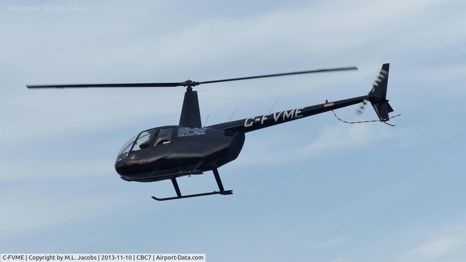 C-FVME, 2004 Robinson R44 II C/N 10562, Sky Helicopters approaching Vancouver Harbour Heliport.