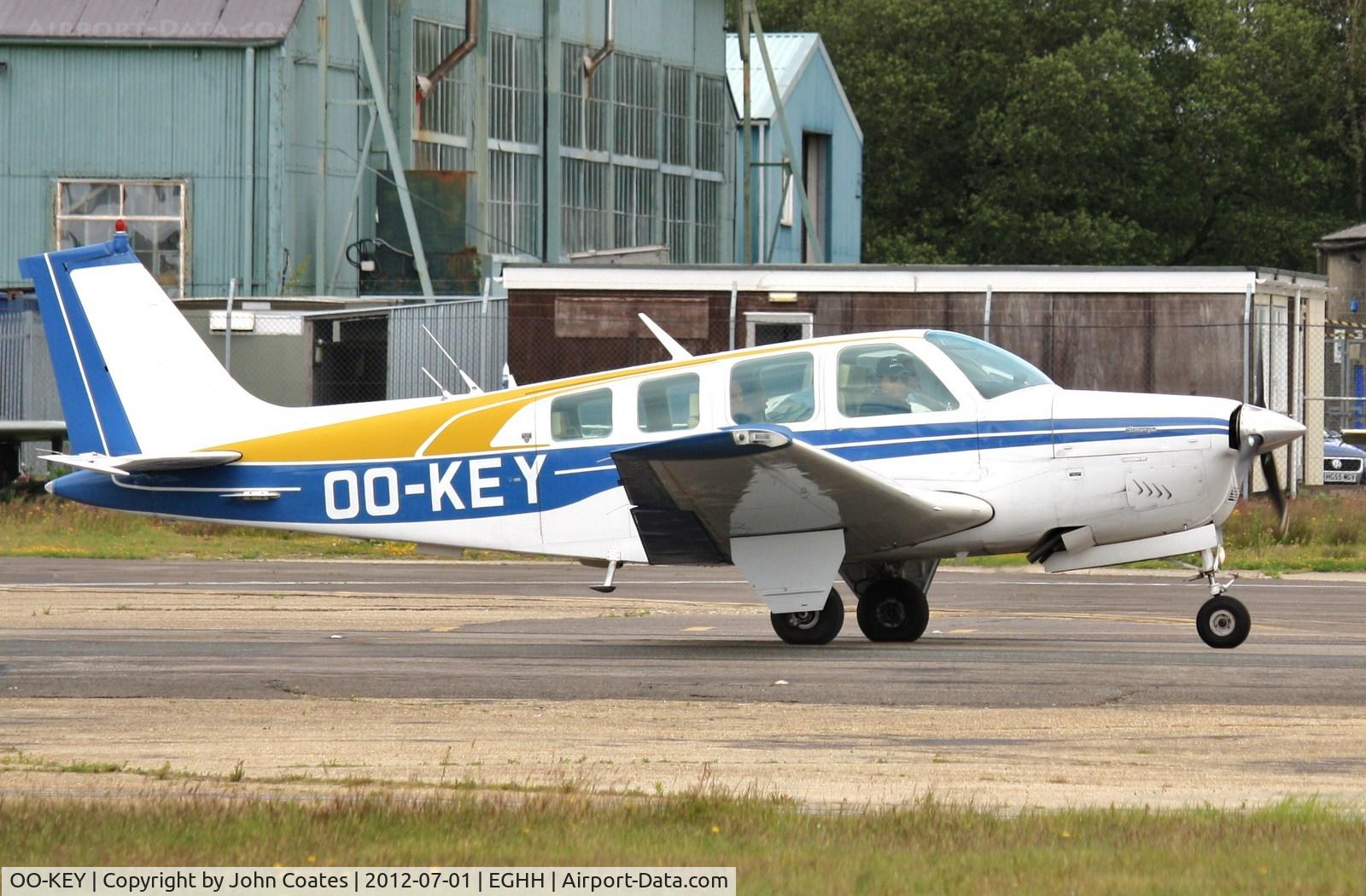 OO-KEY, 1977 Beech A36 Bonanza 36 Bonanza 36 C/N E-1150, Departing BHL