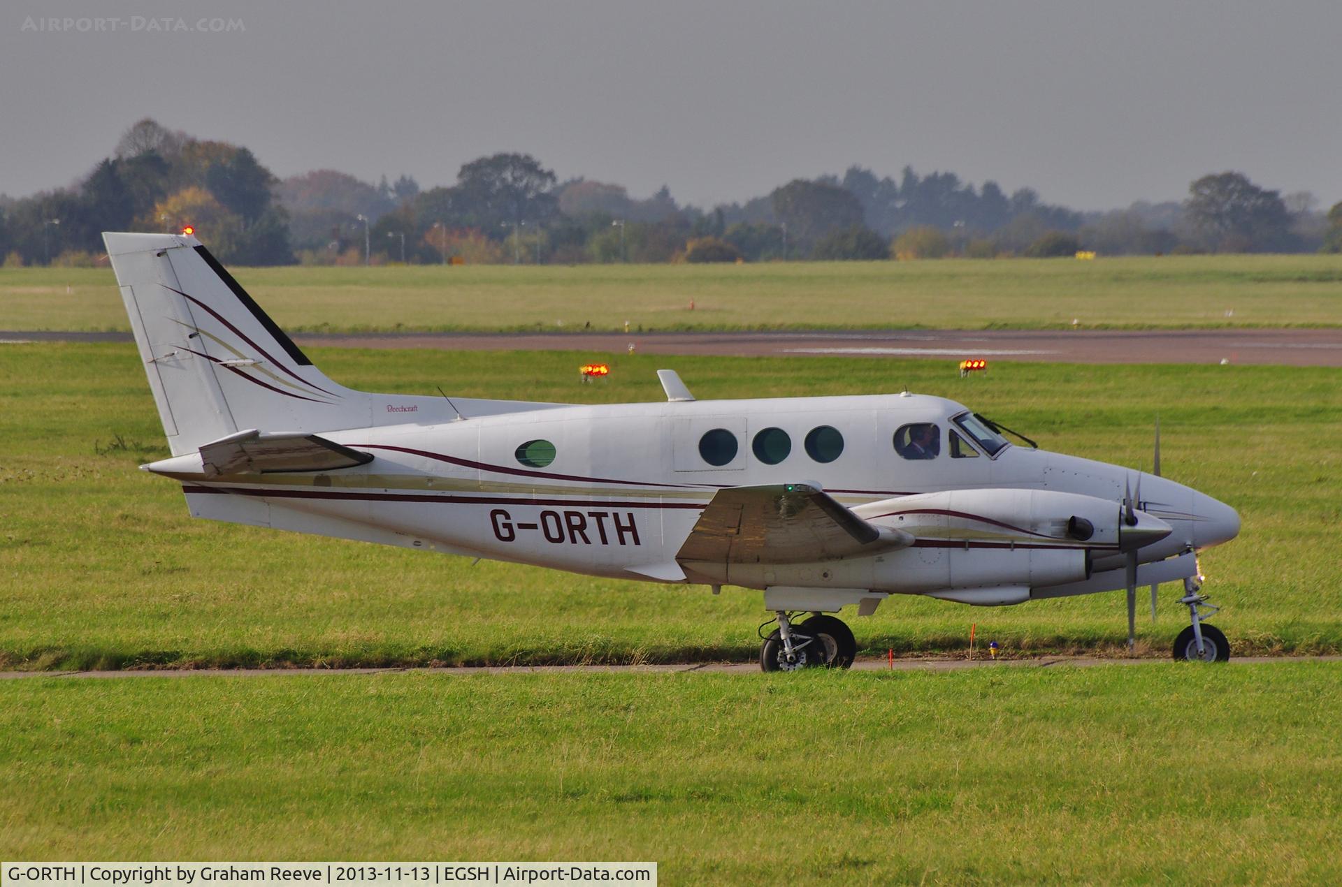 G-ORTH, 1975 Beech E90 King Air C/N LW-136, About to depart from runway 27.