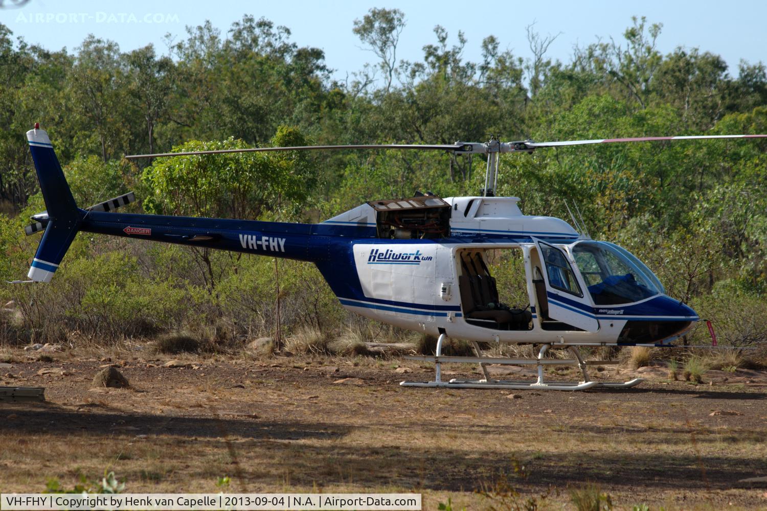 VH-FHY, 1980 Bell 206B-3 JetRanger III C/N 3097, A Slingair Heliwork WA Bell 206B-3 helicopter at the heliport of Mitchell River National Park, Kimberley, Western Australia. Used for sight seeing flights over the magnificent Mitchell Falls.