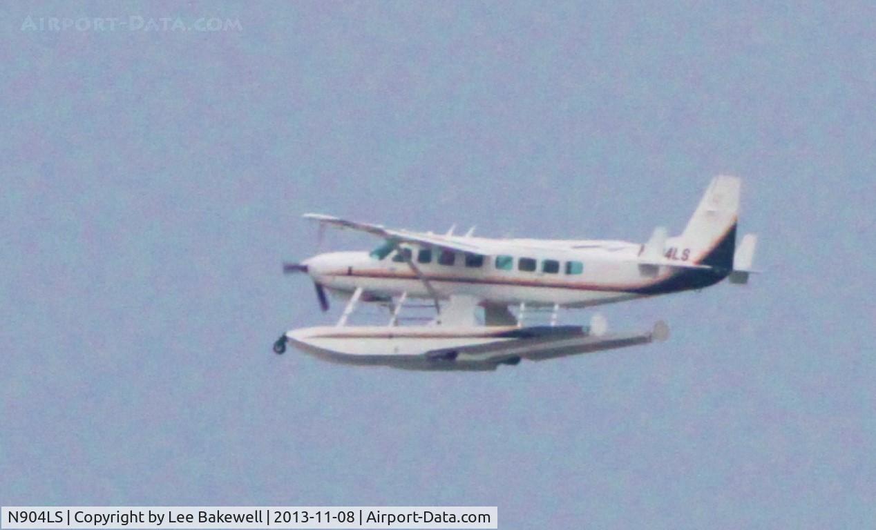 N904LS, 2013 Cessna 208B Grand Caravan C/N 208B-5030, Flying downwind on Forest Lake #2 after having taken off.  Search N904LS on YouTube for video of same.