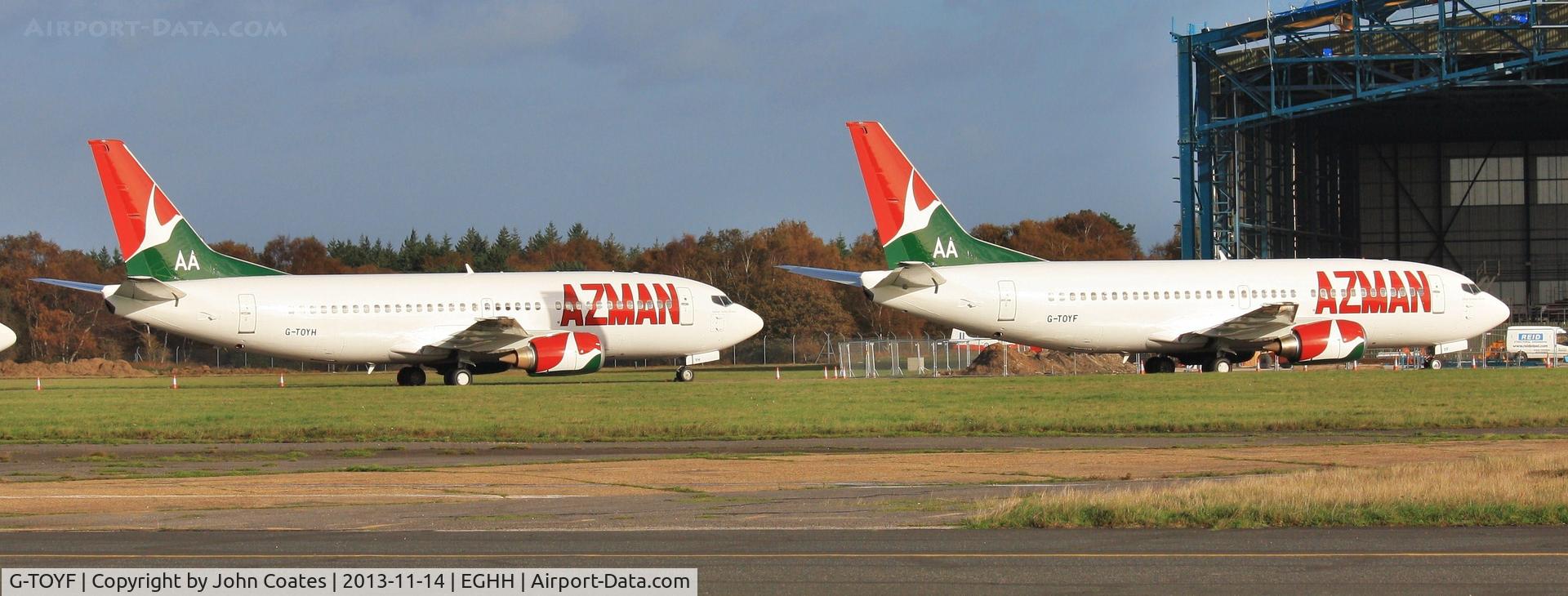 G-TOYF, 1997 Boeing 737-36N C/N 28557, With sister ship G-TOYH awaiting the fitting of new seats at European Aviation