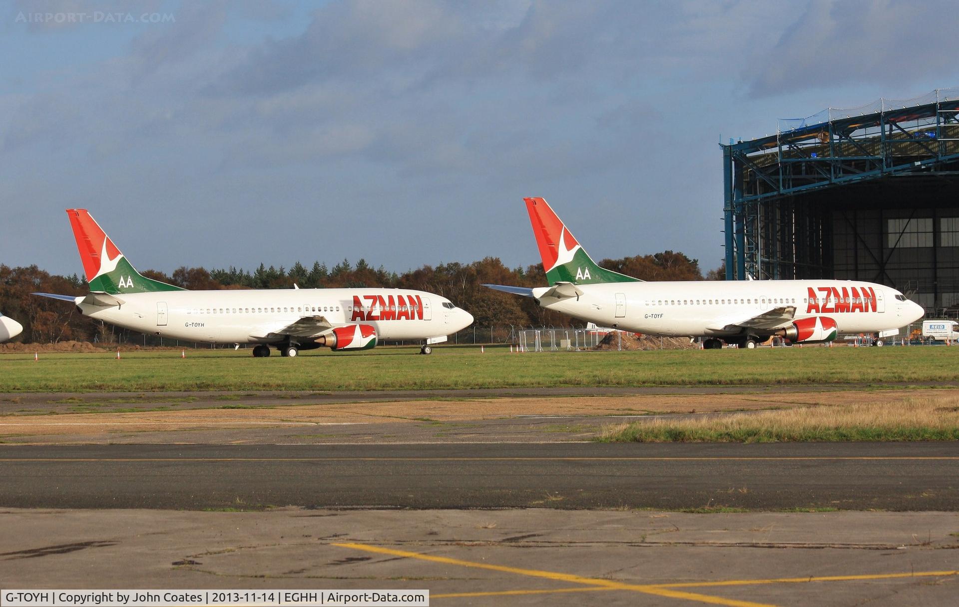 G-TOYH, 1998 Boeing 737-36N C/N 28570, With sister a/c TOYF awaiting the fitting of new seats at European Aviation.