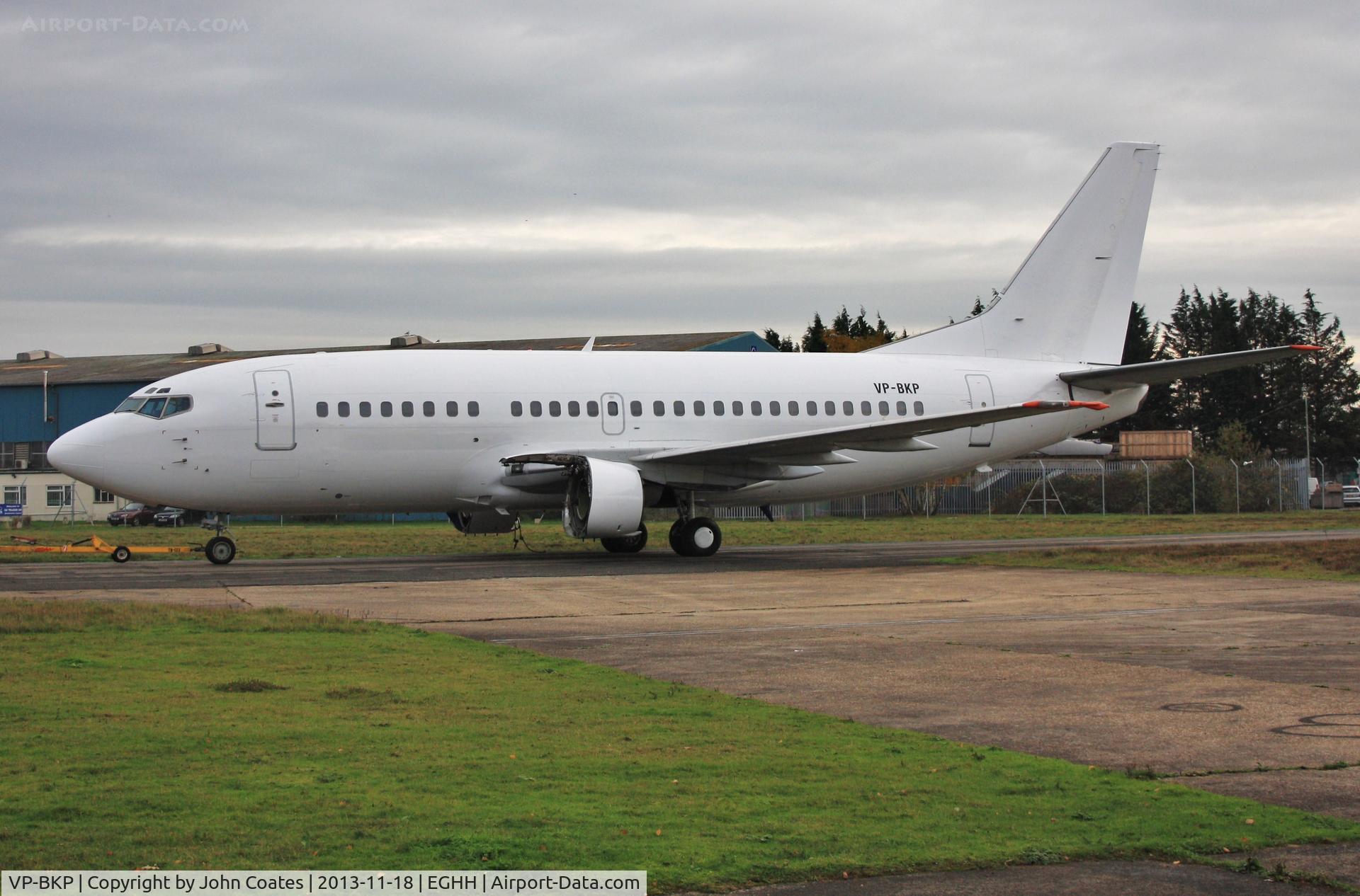VP-BKP, 1991 Boeing 737-59D C/N 25065, Off to temp storage area.