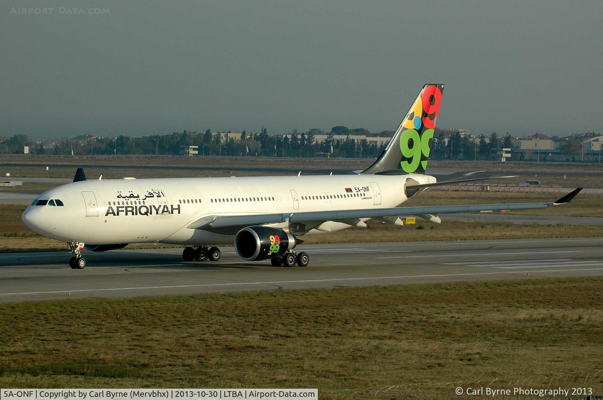 5A-ONF, 2009 Airbus A330-202 C/N 999, Taken from the Fly Inn Shopping Mall.