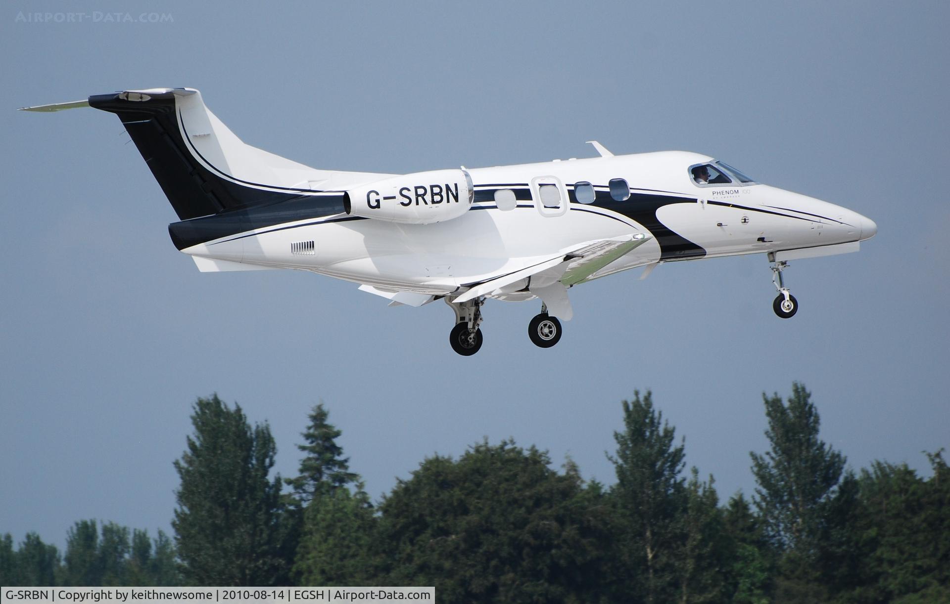 G-SRBN, 2009 Embraer EMB-500 Phenom 100 C/N 50000056, Landing onto runway 09 in good light !