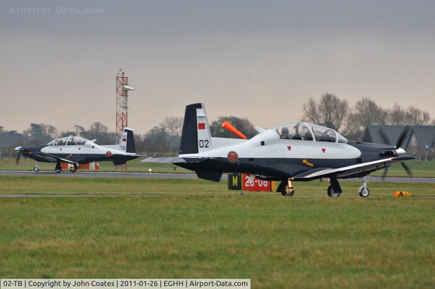 02-TB, 2010 Raytheon T-6C Texan II C/N PM-2, Departing on delivery with 04-TD