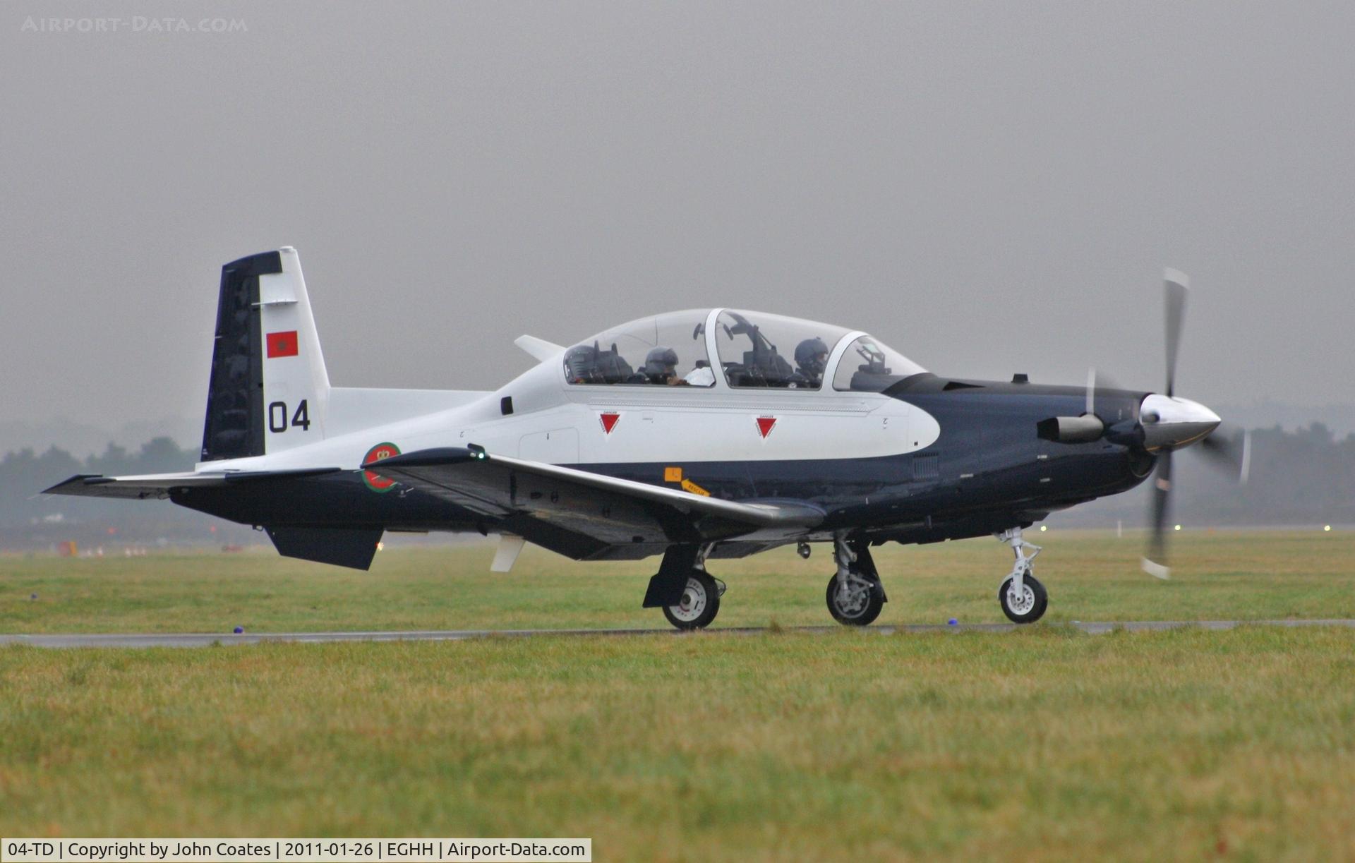 04-TD, Raytheon T-6C Texan II C/N PM-4, Taxiing to depart on delivery