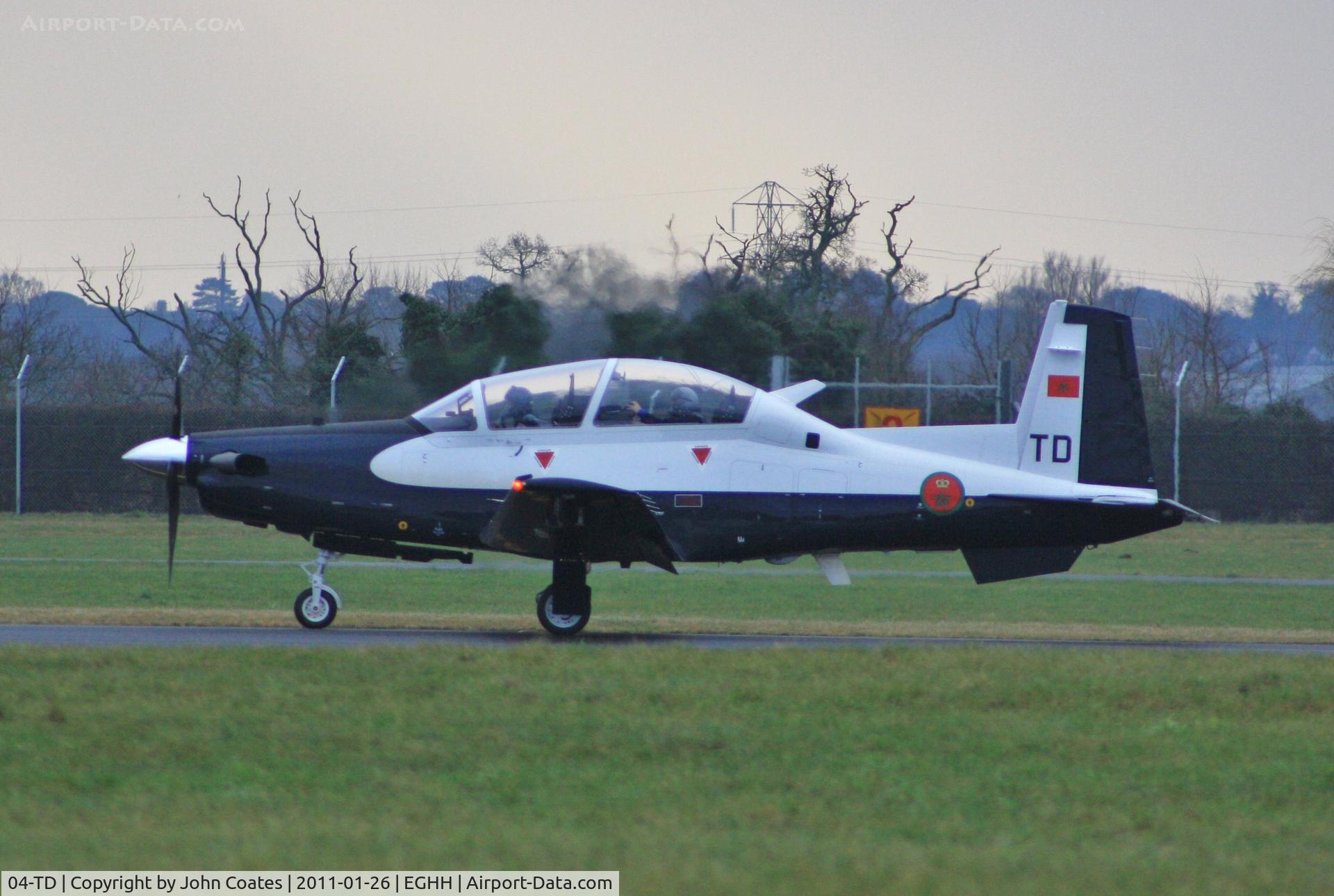 04-TD, Raytheon T-6C Texan II C/N PM-4, Departing on delivery