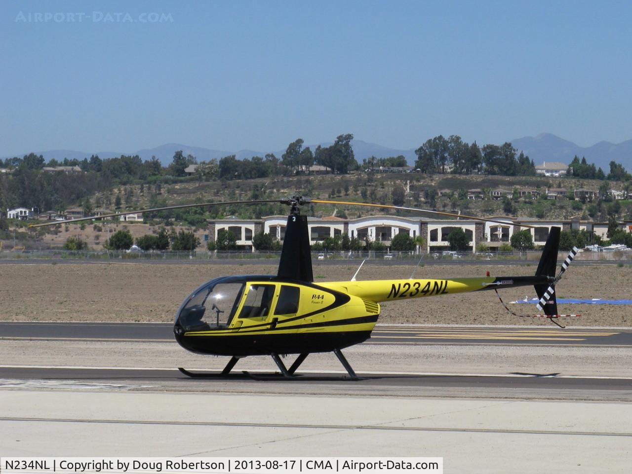 N234NL, 2004 Robinson R44 II C/N 10575, 2004 Robinson R44 RAVEN II, Lycoming IO-540-AE1A5 derated to 245 Hp for 5 minutes, 205 Hp continuous, on airshow ramp awaiting paid airshow passengers