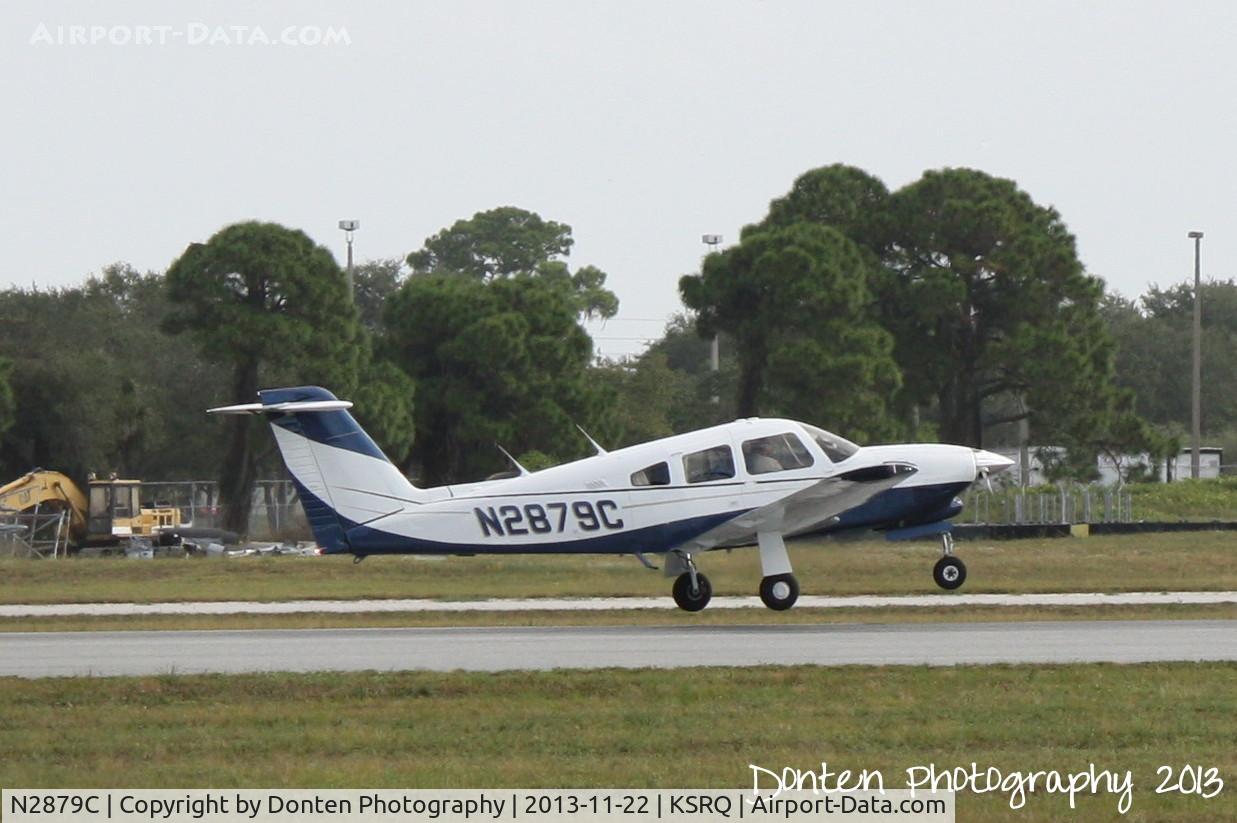 N2879C, 1979 Piper PA-28RT-201T Arrow IV C/N 28R-7931237, Piper Cherokee (N2879C) departs Sarasota-Bradenton International Airport