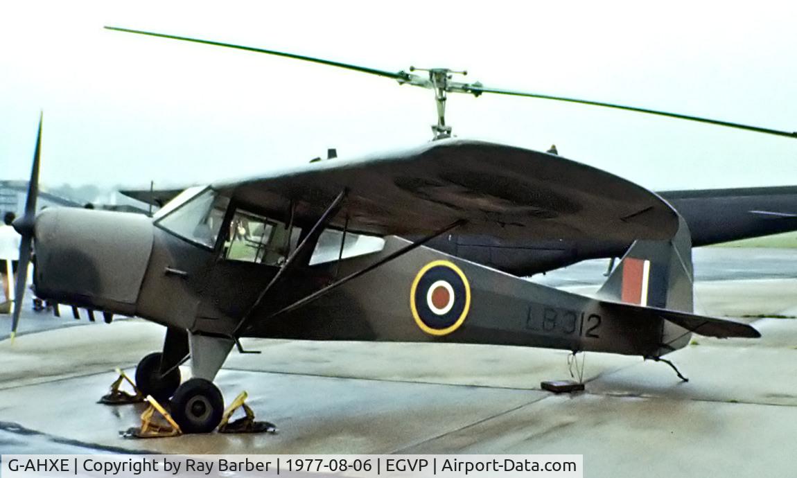 G-AHXE, 1942 Taylorcraft Auster Plus D C/N 171, Taylorcraft Plus D [171] AAC Middle Wallop~G 06/08/1977 Marked LB312. Taken from a slide.