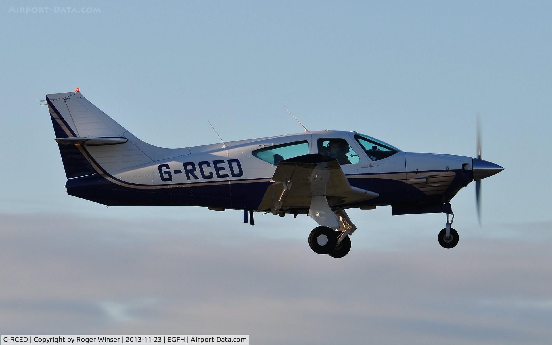 G-RCED, 1977 Rockwell Commander 114 C/N 14241, Visiting Commander 114 departing Runway 04. Previously registered VR-CED.